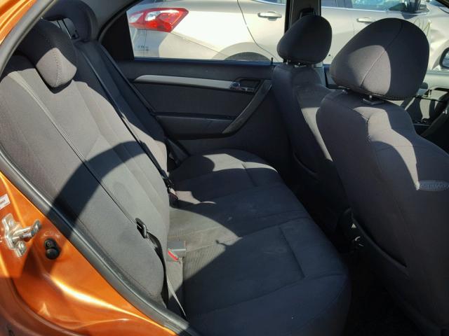 KL1TD56658B065038 - 2008 CHEVROLET AVEO BASE Pomarańczowy zdjęcie 6