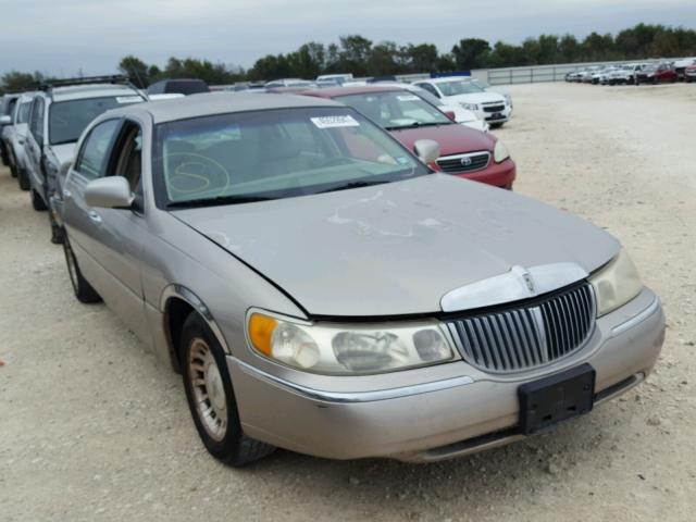 1LNHM81W31Y665076 - 2001 LINCOLN TOWN CAR E TAN photo 1