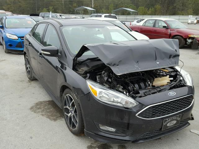 1FADP3F27FL304396 - 2015 FORD FOCUS SE BLACK photo 1