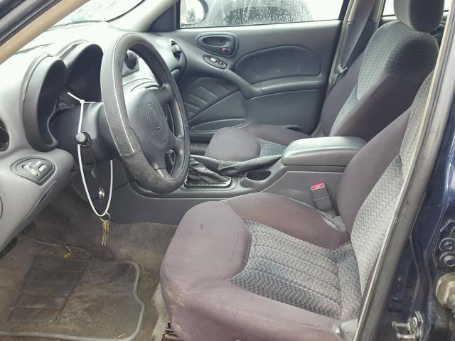 1G2NE52F84M571809 - 2004 PONTIAC GRAND AM S BLUE photo 5