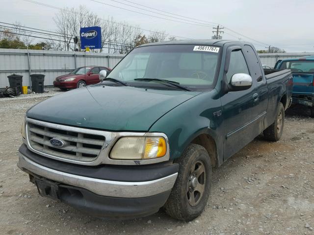 1FTZX1728YNC14345 - 2000 FORD F150 GREEN photo 2