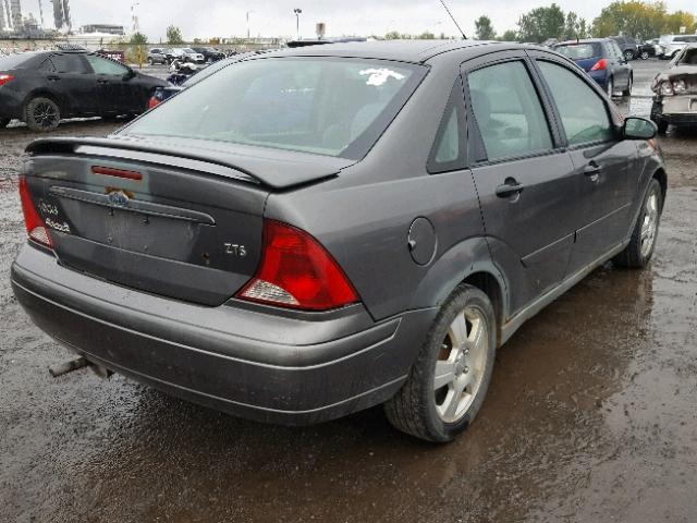 1FAFP38374W149889 - 2004 FORD FOCUS ZTS GRAY photo 4