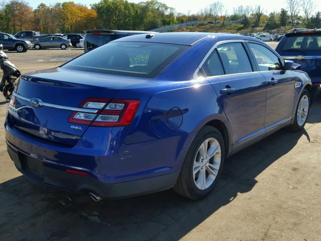 1FAHP2E87EG111609 - 2014 FORD TAURUS SEL BLUE photo 4