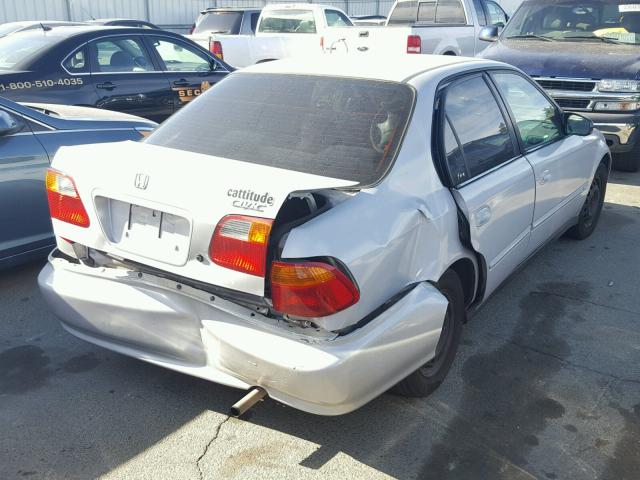 2HGEJ6619YH509020 - 2000 HONDA CIVIC BASE SILVER photo 4