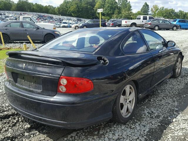 6G2VX12G74L282604 - 2004 PONTIAC GTO BLACK photo 4