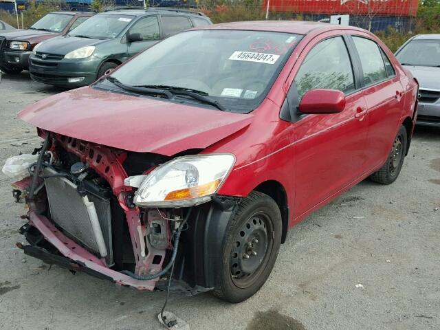 JTDBT903291309734 - 2009 TOYOTA YARIS RED photo 2