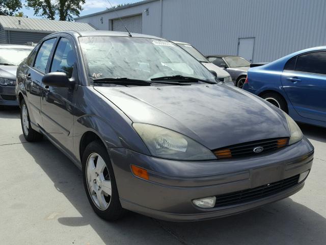 1FAHP38Z74W110832 - 2004 FORD FOCUS ZTS GRAY photo 1
