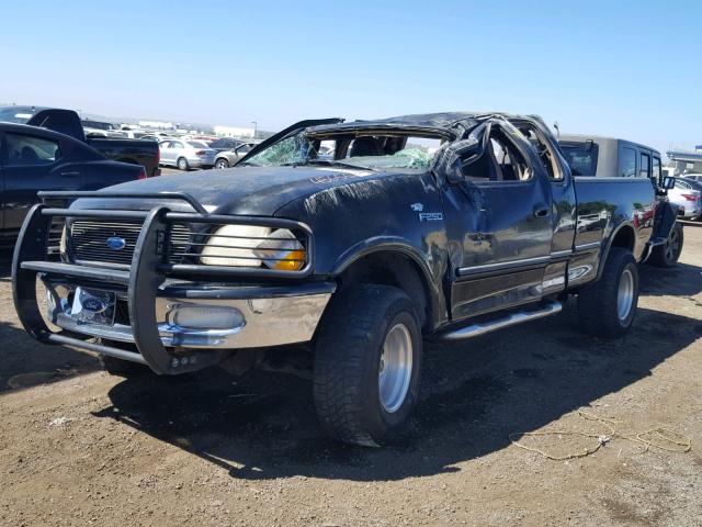 1FTFX28L0VKC80210 - 1997 FORD F250 BLACK photo 2