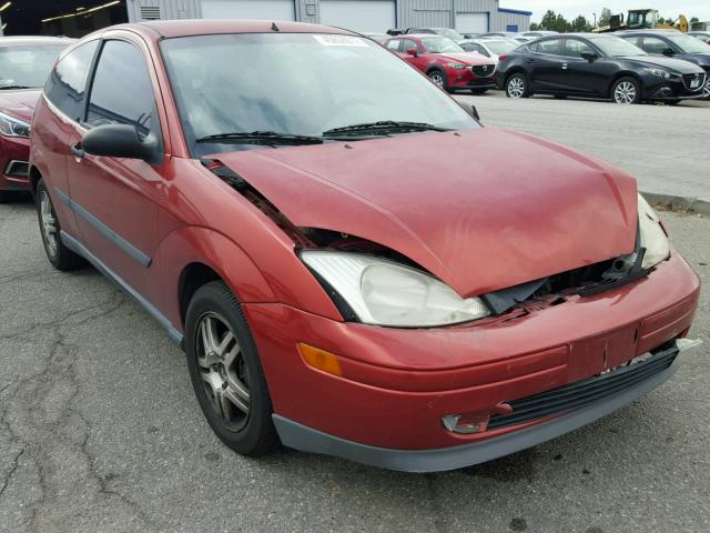 3FAFP3135YR240677 - 2000 FORD FOCUS ORANGE photo 1