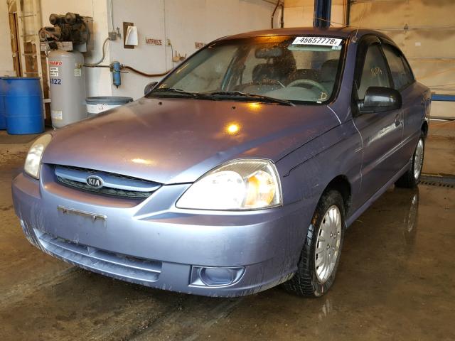 KNADC125746315742 - 2004 KIA RIO BLUE photo 2