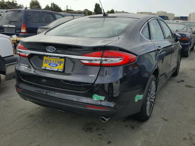 3FA6P0PU4HR329901 - 2017 FORD FUSION SE BLACK photo 4