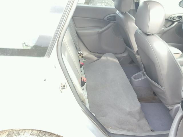 1FAFP36312W180717 - 2002 FORD FOCUS SILVER photo 6