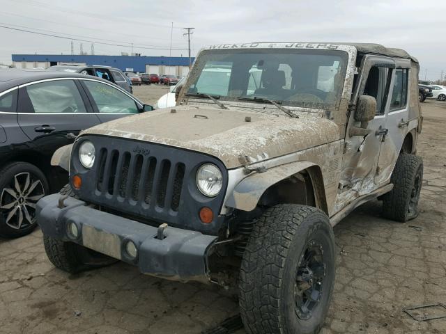 1J4BA3H16AL231175 - 2010 JEEP WRANGLER U SILVER photo 2