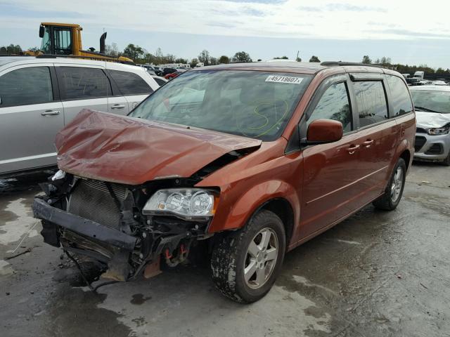 2C4RDGCG3CR251053 - 2012 DODGE GRAND CARA ORANGE photo 2