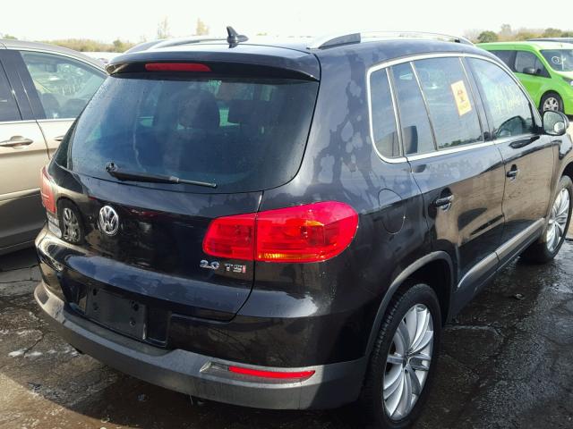 WVGAV3AX4EW502366 - 2014 VOLKSWAGEN TIGUAN S BLACK photo 4