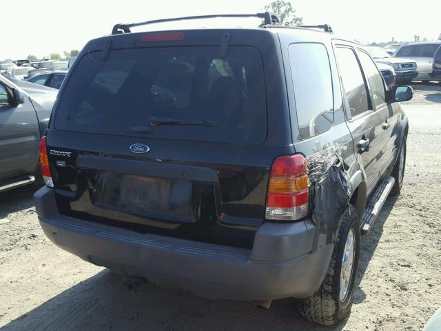 1FMYU04161KF10641 - 2001 FORD ESCAPE BLACK photo 4