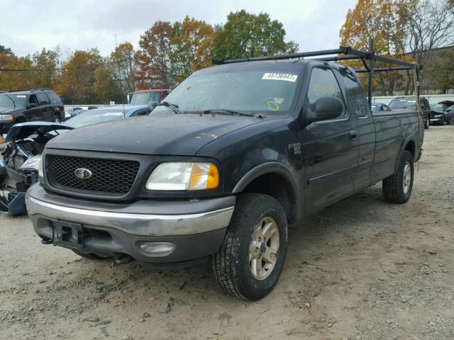 1FTRX18L33NA39129 - 2003 FORD F150 BLACK photo 2