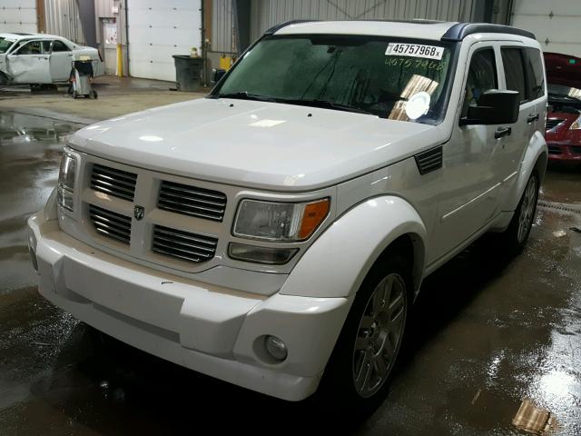 1D4PU4GX4BW607311 - 2011 DODGE NITRO HEAT WHITE photo 2