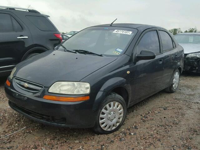 KL1TD52615B323783 - 2005 CHEVROLET AVEO BASE BLACK photo 2