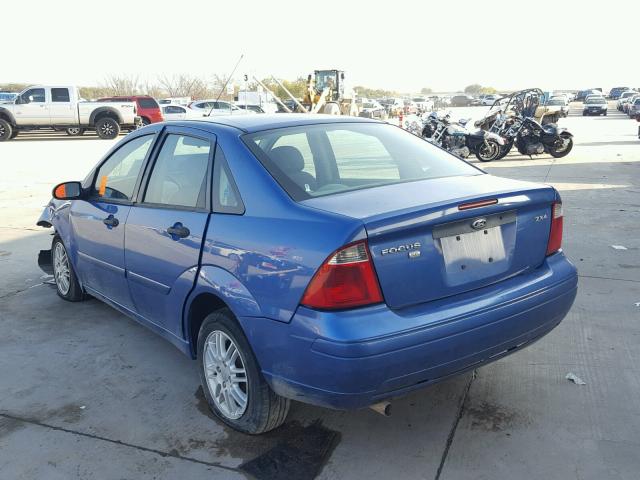 1FAFP34N95W119169 - 2005 FORD FOCUS BLUE photo 3