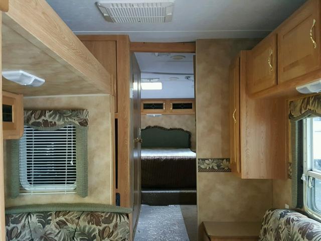 4YDF245266E319689 - 2006 KEYSTONE HORNET WHITE photo 5