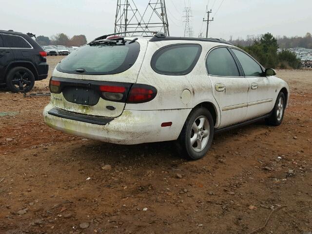 1FAFP58201A185256 - 2001 FORD TAURUS SE WHITE photo 4