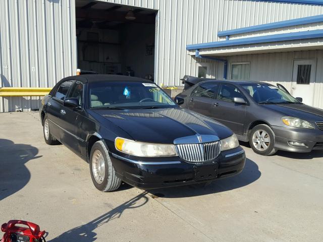 1LNHM81W7XY641811 - 1999 LINCOLN TOWN CAR E BLACK photo 1