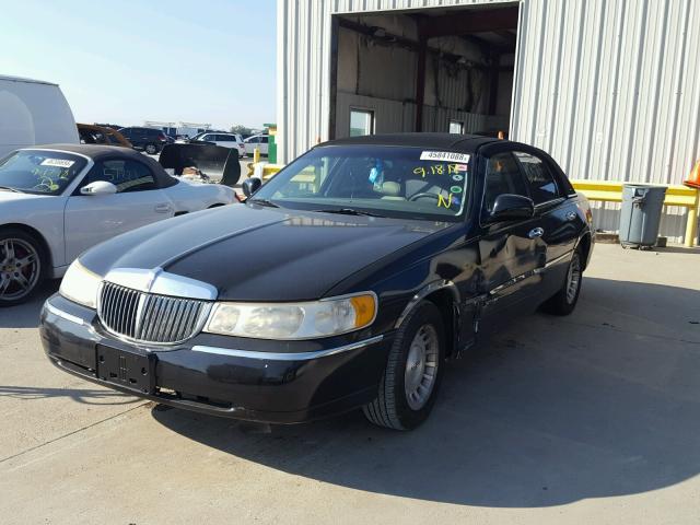 1LNHM81W7XY641811 - 1999 LINCOLN TOWN CAR E BLACK photo 2