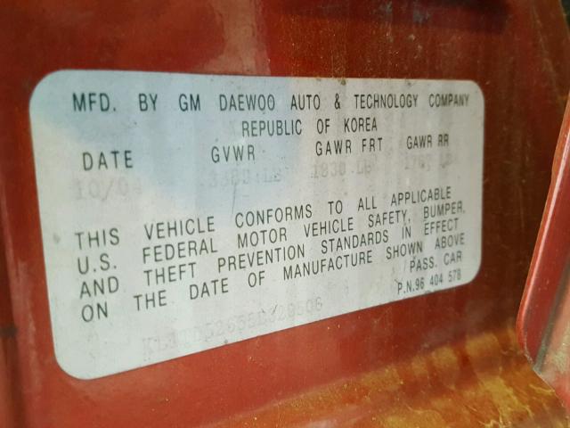 KL1TD52655B329506 - 2005 CHEVROLET AVEO BASE Czerwony zdjęcie 10