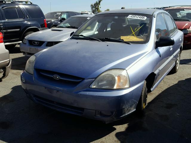 KNADC125246338779 - 2004 KIA RIO BLUE photo 2