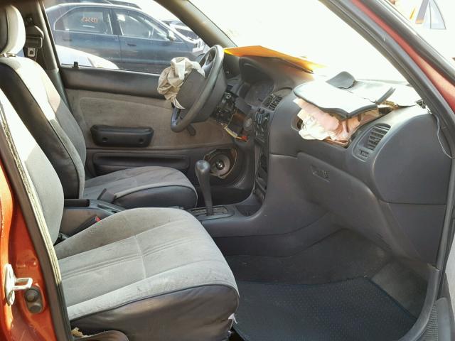 1Y1SK5263SZ075013 - 1995 GEO PRIZM BASE RED photo 5