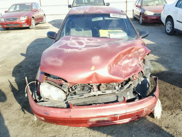 1Y1SK5263SZ075013 - 1995 GEO PRIZM BASE RED photo 9