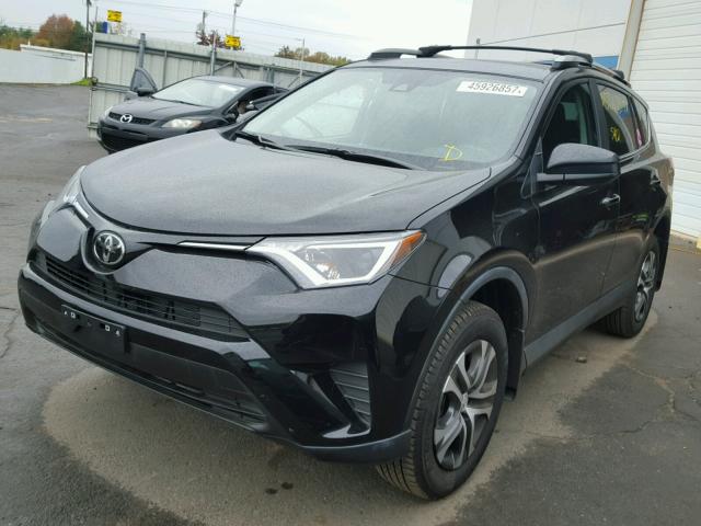 2T3ZFREV8HW338512 - 2017 TOYOTA RAV4 LE BLACK photo 2