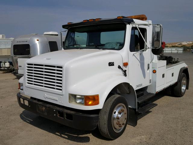 1HTSCABMXXH693681 - 1999 INTERNATIONAL 4000 4700 WHITE photo 2