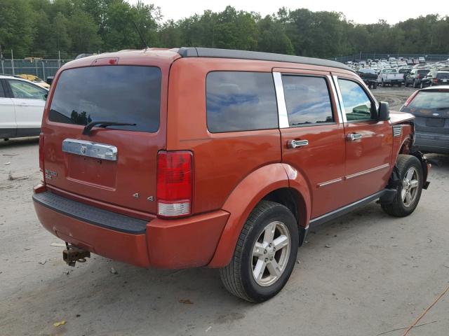 1D8GU58K07W639641 - 2007 DODGE NITRO SLT ORANGE photo 4