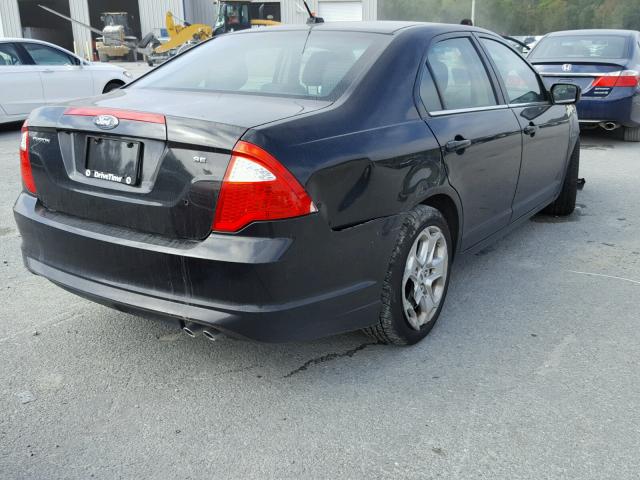 3FAHP0HA7BR160011 - 2011 FORD FUSION SE BLACK photo 4