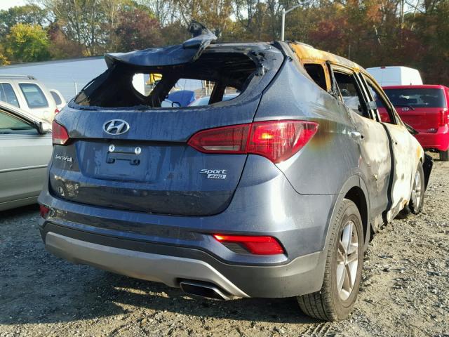 5NMZUDLB1HH016252 - 2017 HYUNDAI SANTA FE S BURN photo 4