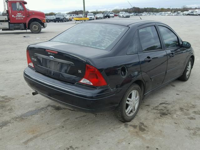 1FAHP34383W288538 - 2003 FORD FOCUS SE C BLACK photo 4