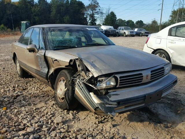 1G3HN52K7S4835394 - 1995 OLDSMOBILE 88 ROYALE BEIGE photo 1