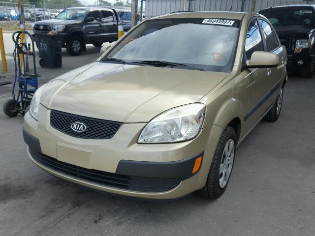 KNADE223X96508800 - 2009 KIA RIO BASE GOLD photo 2