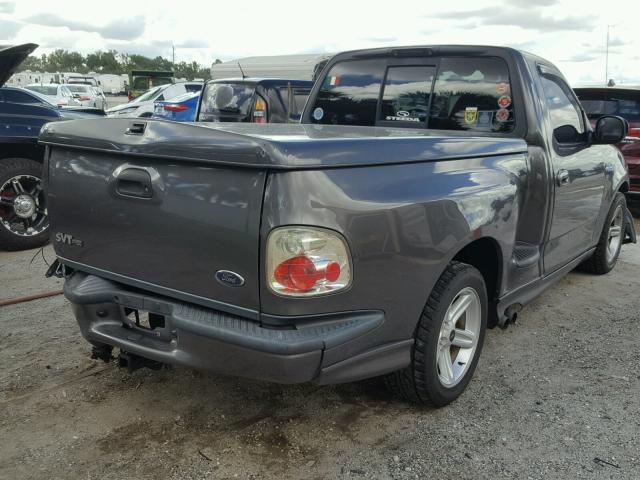 2FTRF073X4CA24911 - 2004 FORD F150 SVT L SILVER photo 4