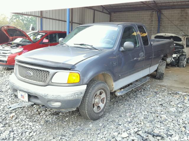 2FTRX18W04CA26081 - 2004 FORD F-150 HERI GRAY photo 2