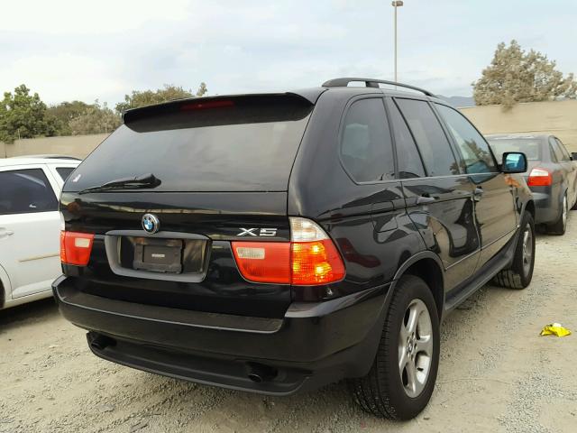 5UXFA53552LP47556 - 2002 BMW X5 3.0I BLACK photo 4