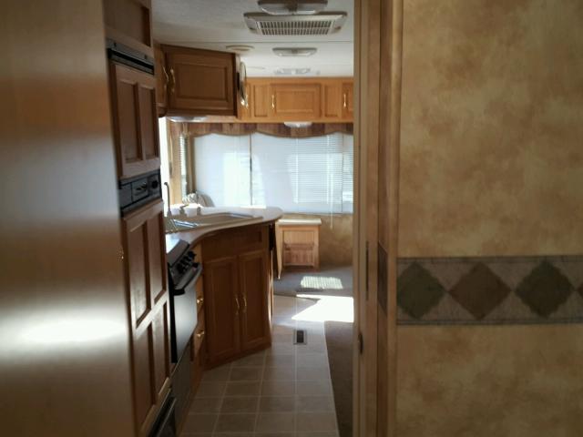 4YDT29R235E317505 - 2005 KEYSTONE HORNET WHITE photo 7