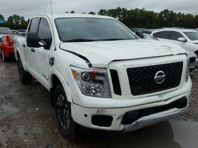 1N6AA1E59HN570554 - 2017 NISSAN TITAN SV WHITE photo 1