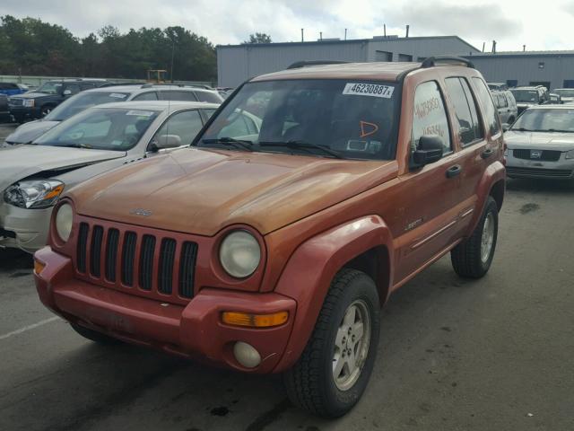 1J4GK58K62W211306 - 2002 JEEP LIBERTY LI ORANGE photo 2