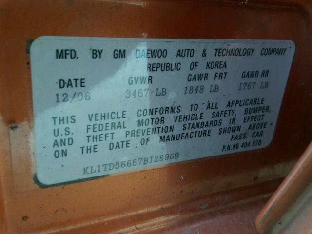 KL1TD56667B128968 - 2007 CHEVROLET AVEO BASE Pomarańczowy zdjęcie 10