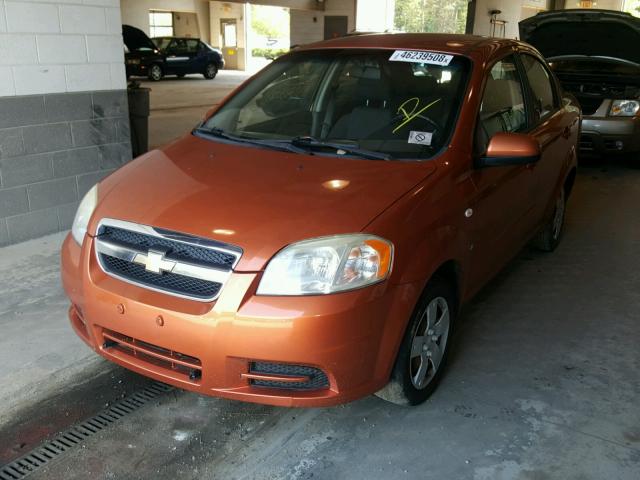 KL1TD56667B128968 - 2007 CHEVROLET AVEO BASE Pomarańczowy zdjęcie 2