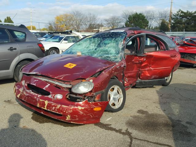 1FAFP58U0XA226012 - 1999 FORD TAURUS SE RED photo 2