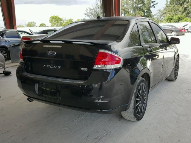 1FAHP36NX9W113568 - 2009 FORD FOCUS SES BLACK photo 4